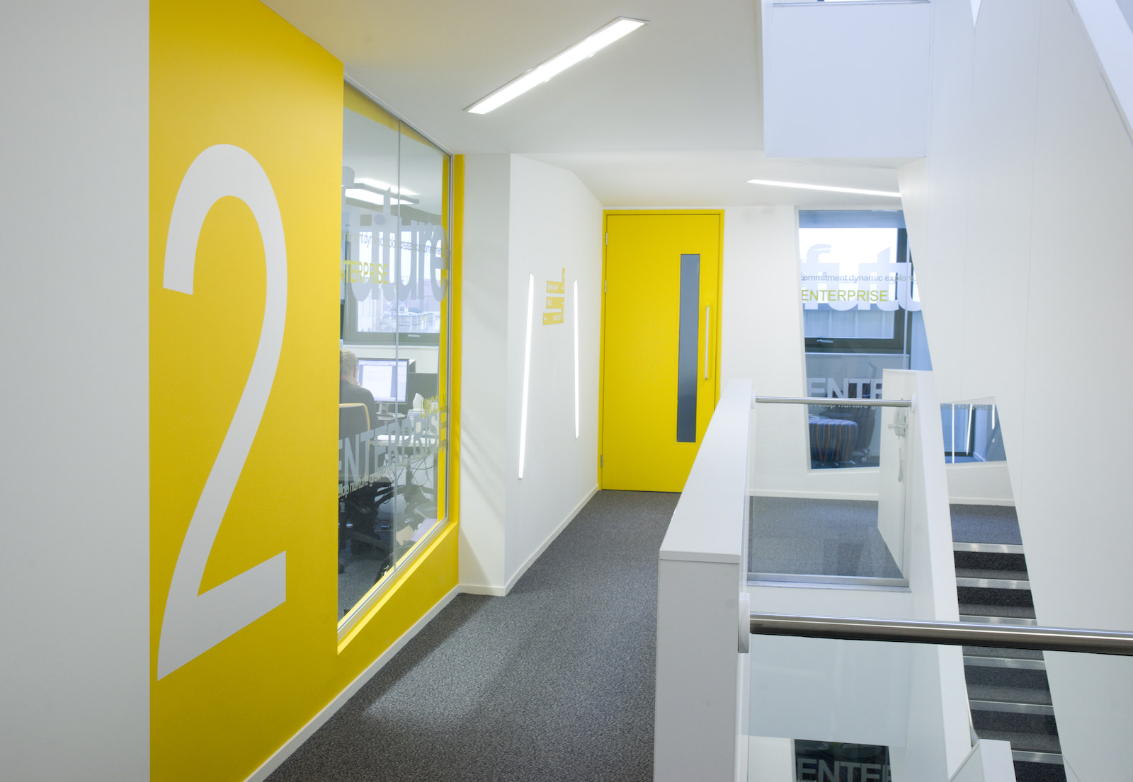 yellow and white minimal architecture design of the enterprise building