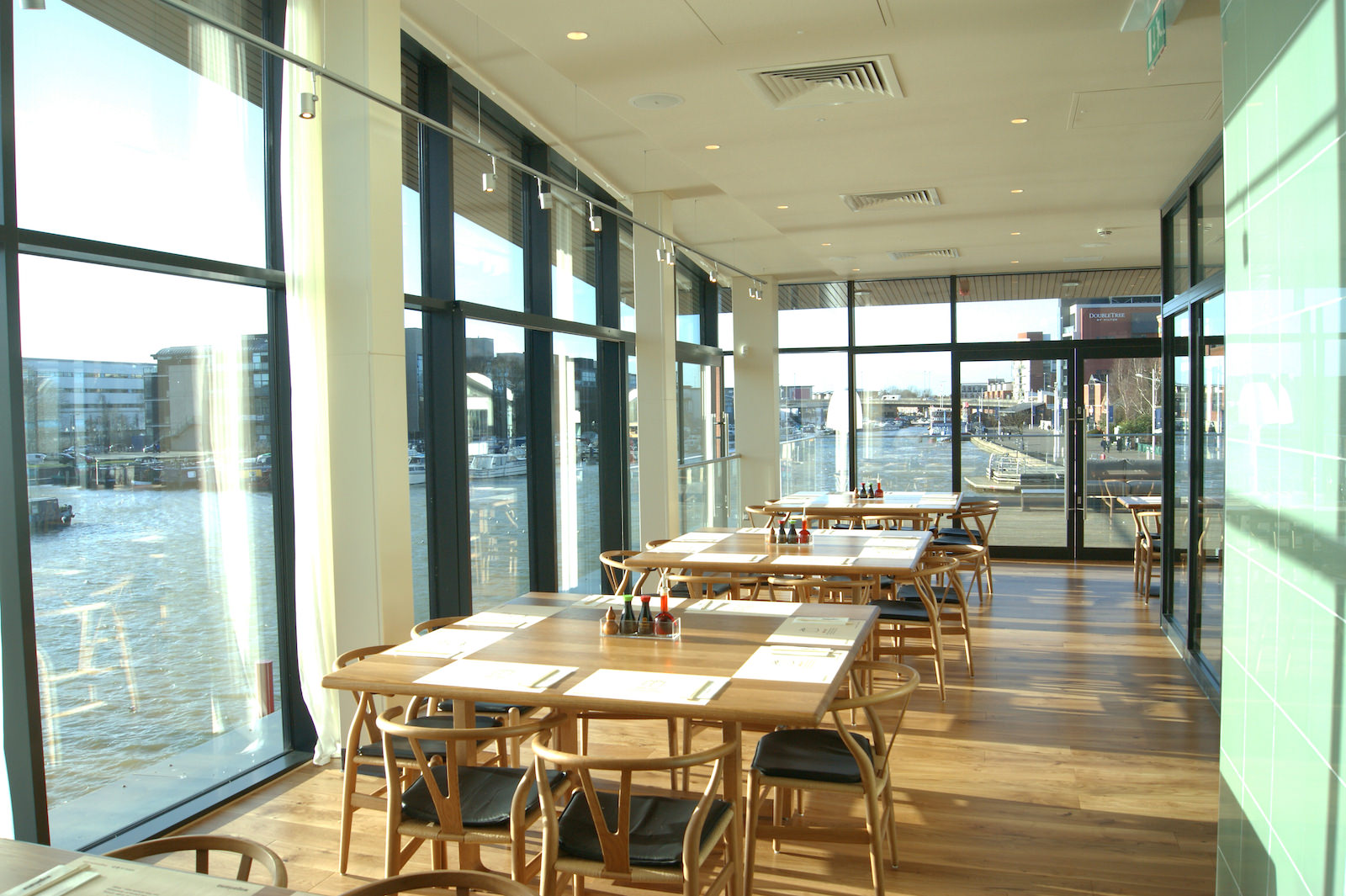 interior design of the modern wagamama restaurant by stem architects